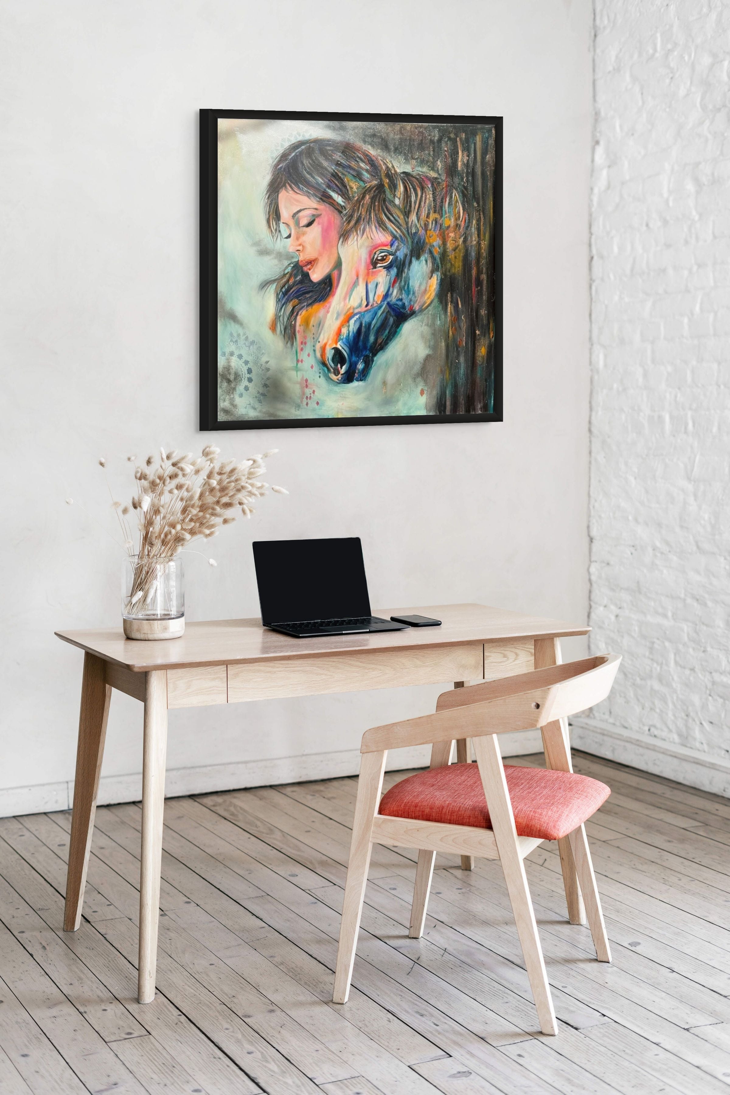 Contemporary figurative portrait painting “Horse Dreams” by Kimberly Brayman displayed in a modern interior, featuring a woman and horse in expressive color.
